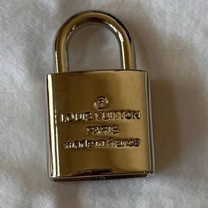 Louis Vuitton small silver lock